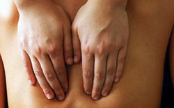 Hands on Back for Massage